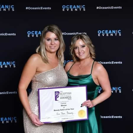 image of Emilia and Joanna collecting their award for the 2023 Best Scottish Hair & Hair beauty Ragional winners